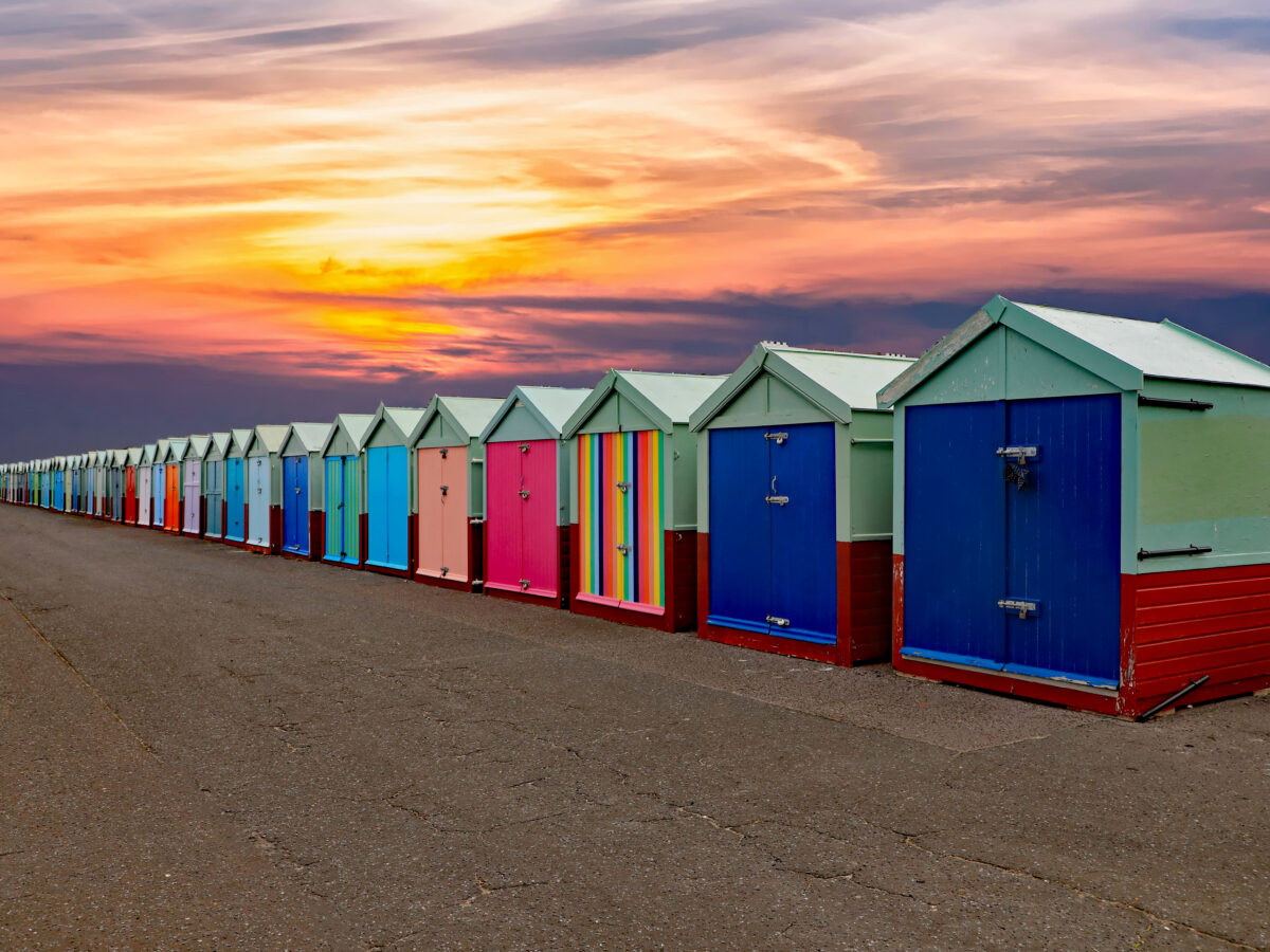 Colorful,Changing,Huts,At,The,Beach,,All,In,A,Row