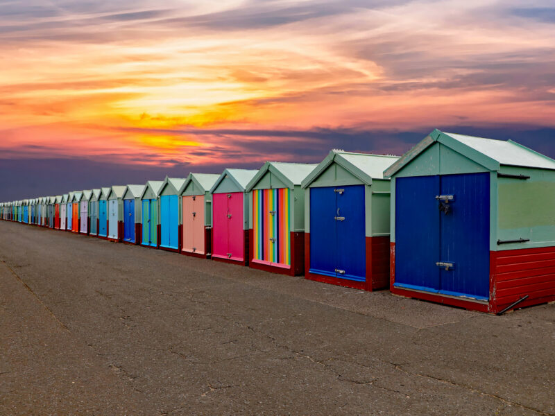 Colorful,Changing,Huts,At,The,Beach,,All,In,A,Row